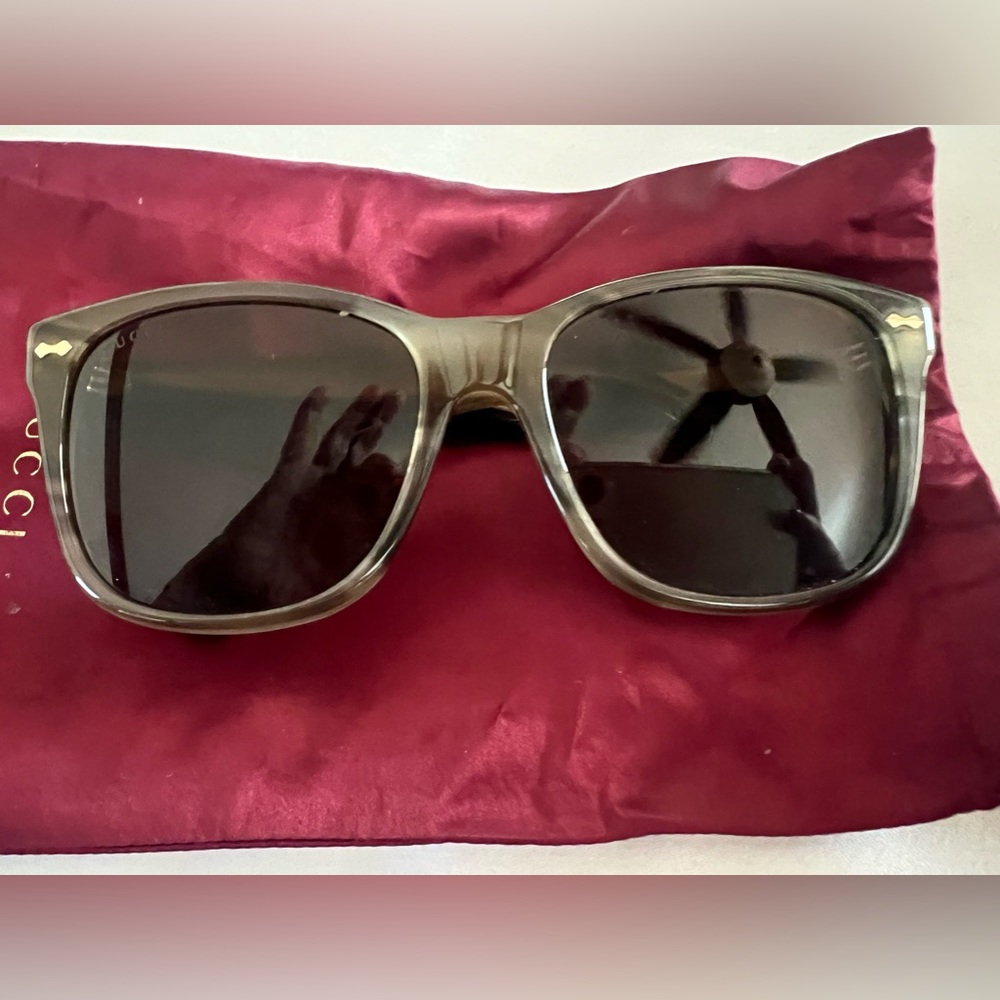 Gucci sunglasses in excellent condition. Square lenses worn very few times.